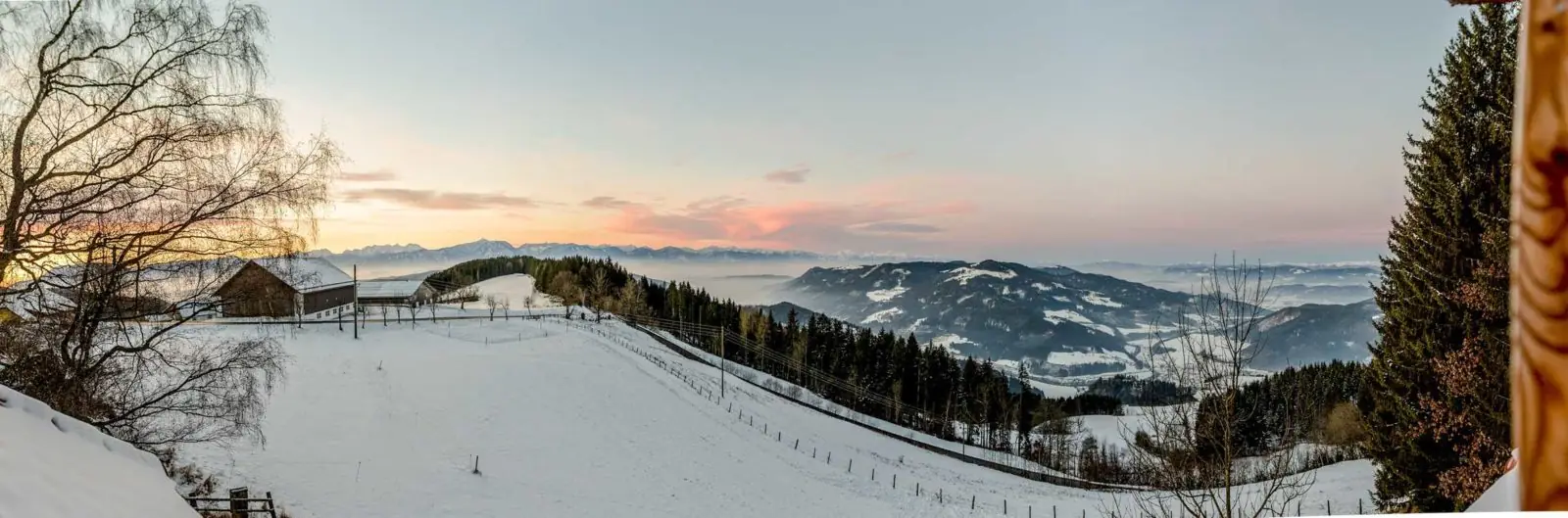 Evening light over the snowy hills